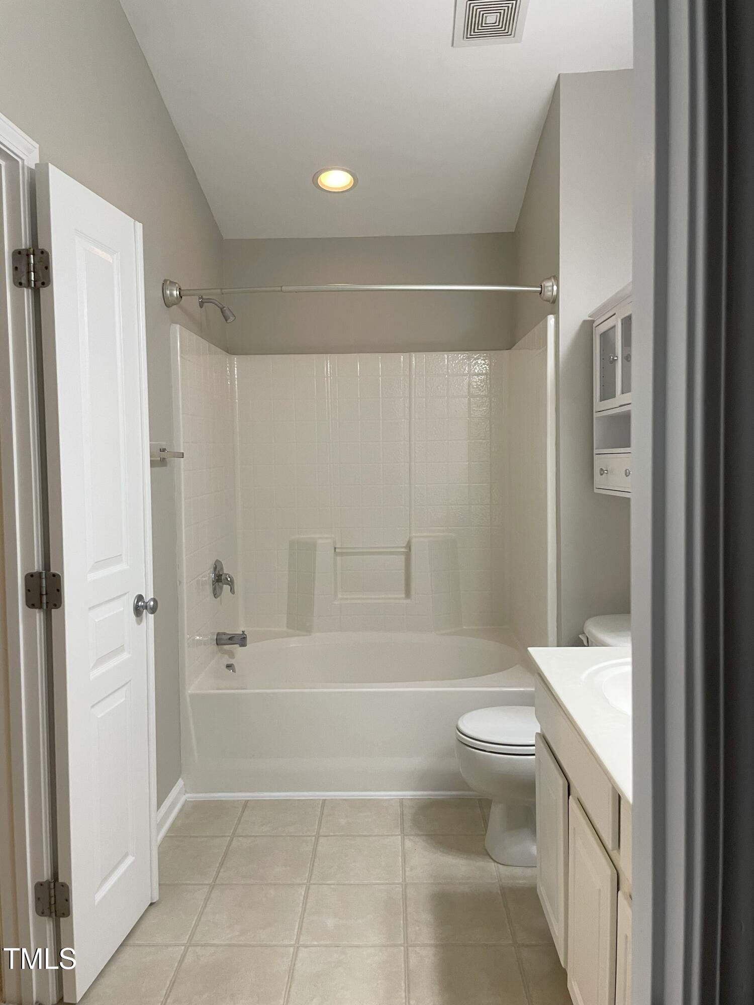 224 Broadgait Brae Road Cary, NC 27519 - Photo 12 of 19 a bathroom with a toilet a sink and bathtub