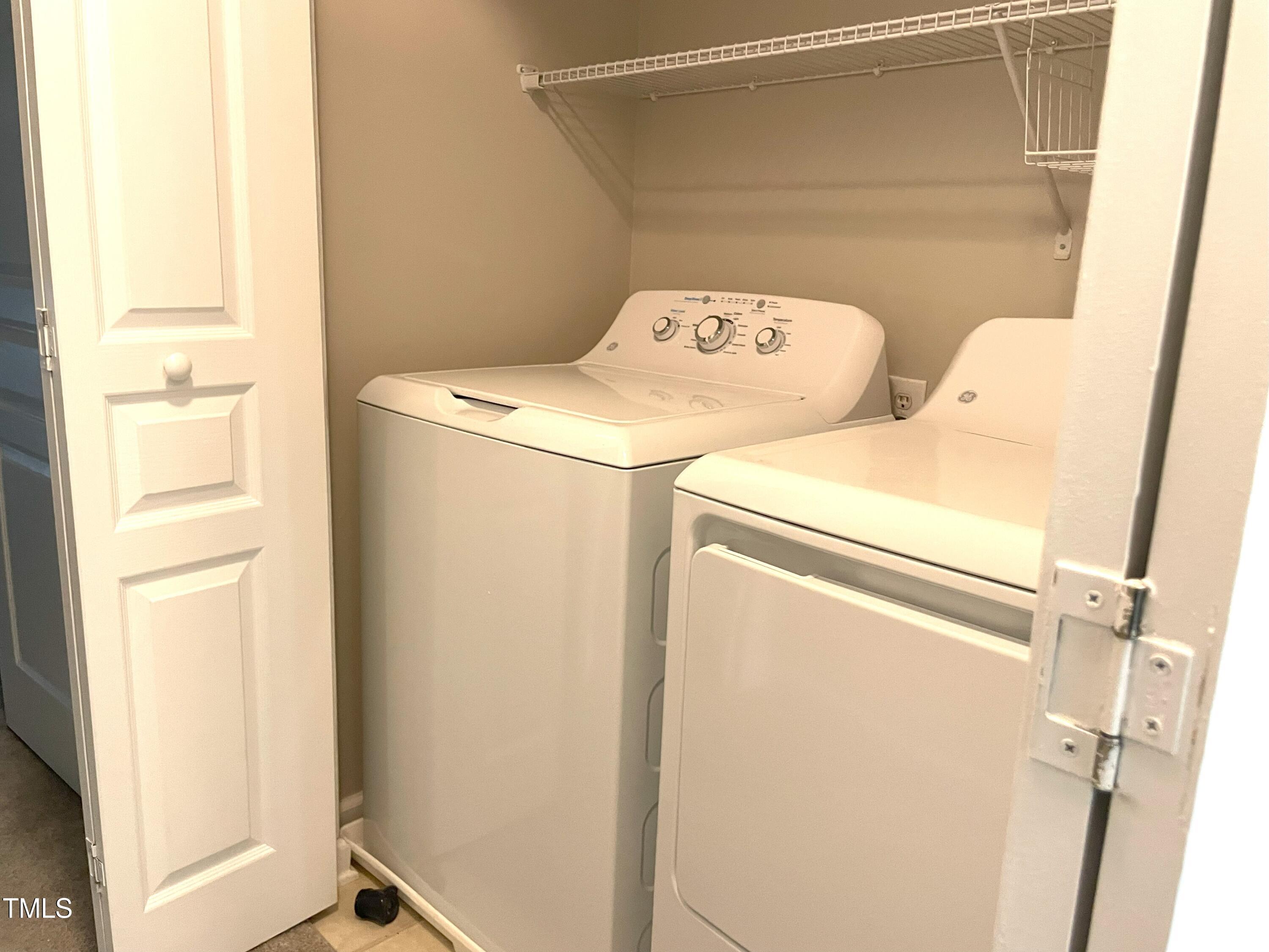 224 Broadgait Brae Road Cary, NC 27519 - Photo 14 of 19 a utility room with dryer and washer