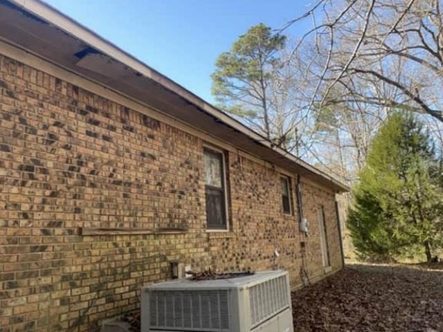 6065 Pine Top Road Henderson, TN 38340 - Photo 2 of 8 a bathroom with a sink and a mirror
