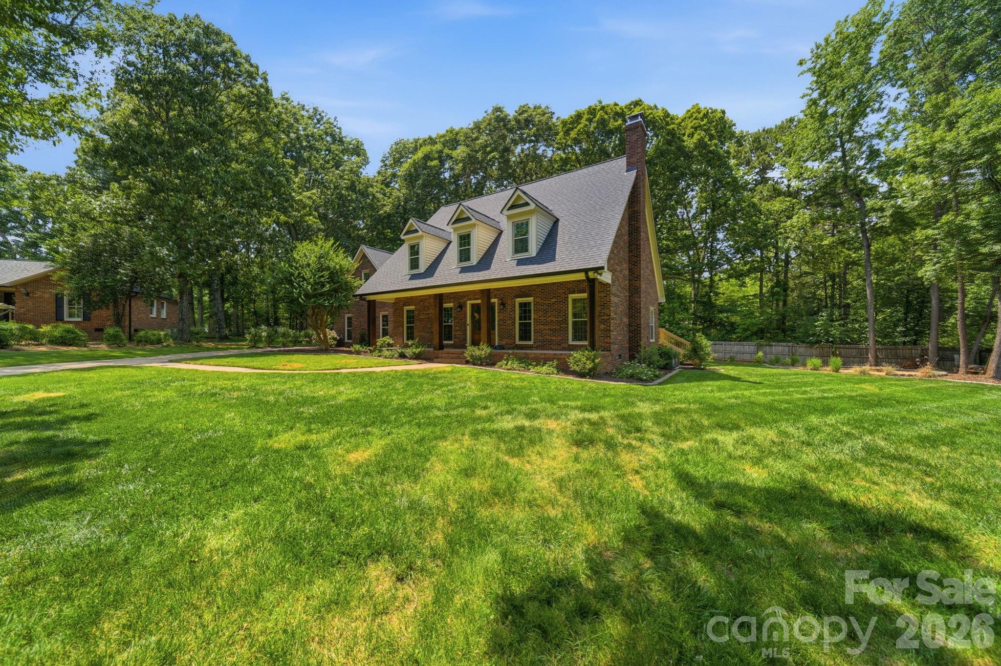 5243 Mintridge Road Mint Hill, NC 28227 - Photo 2 of 43 a view of a house with a big yard