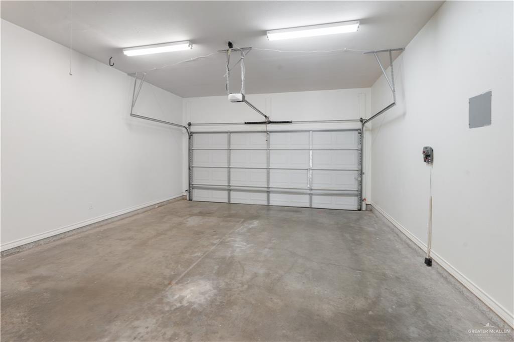 3315 Omega Street Edinburg, TX 78539 - Photo 7 of 19 Garage featuring baseboards