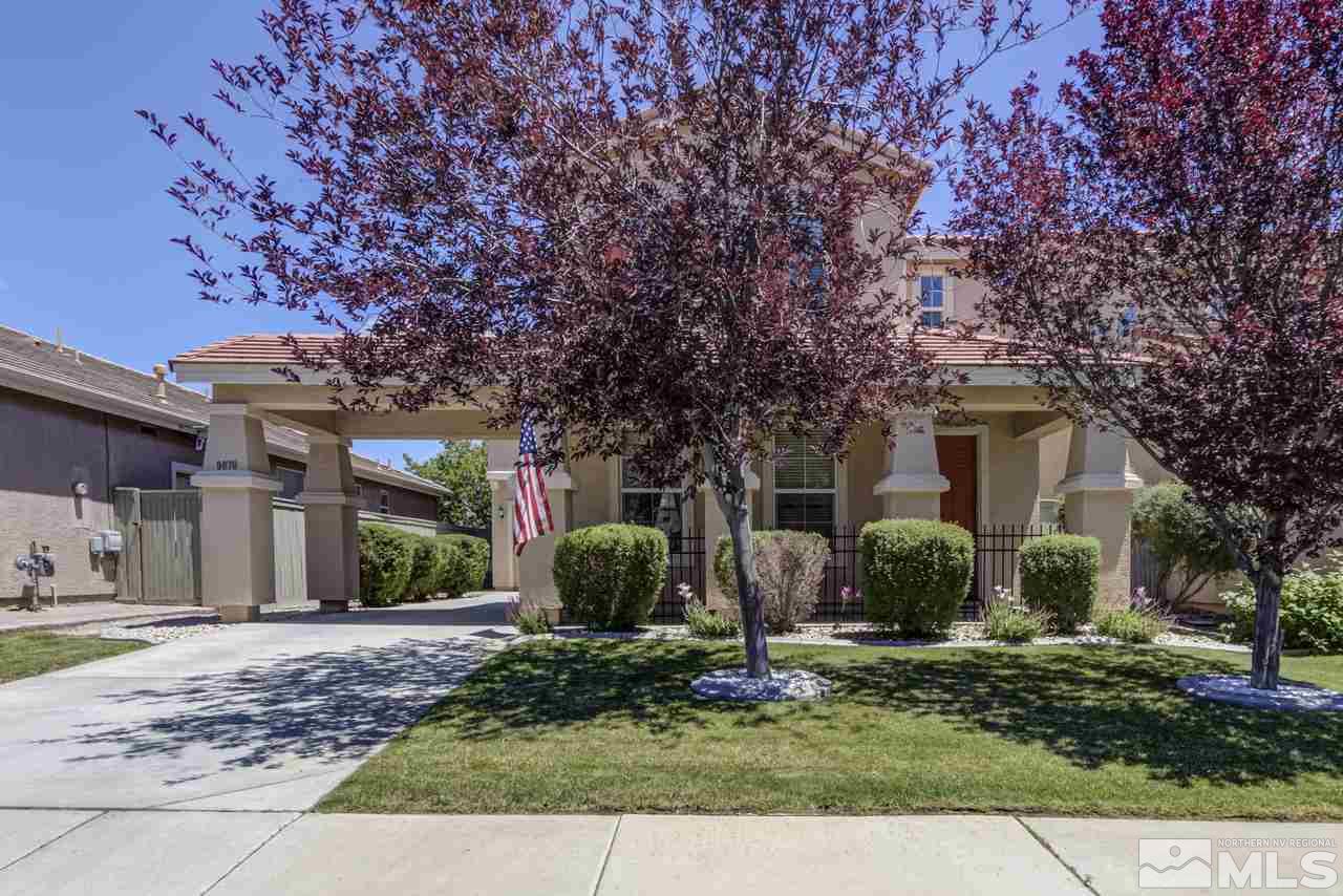 9070 Jack Hammer Drive Reno, NV 89521 - Photo 2 of 40 a front view of a house with garden