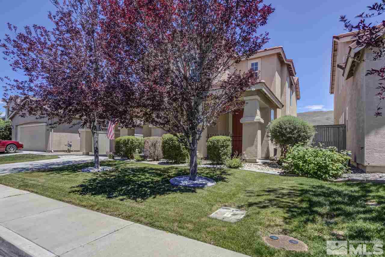9070 Jack Hammer Drive Reno, NV 89521 - Photo 3 of 40 front view of a house with a yard