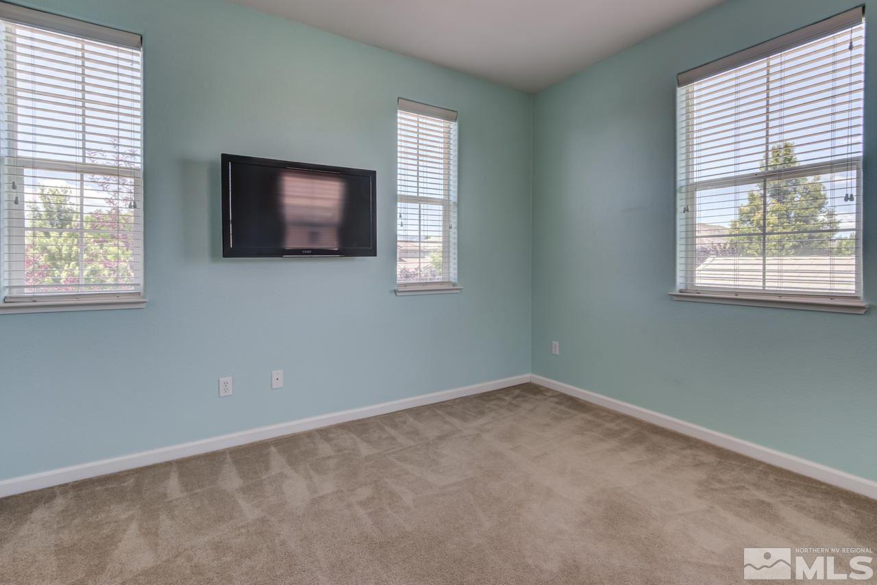 9070 Jack Hammer Drive Reno, NV 89521 - Photo 33 of 40 an empty room with windows