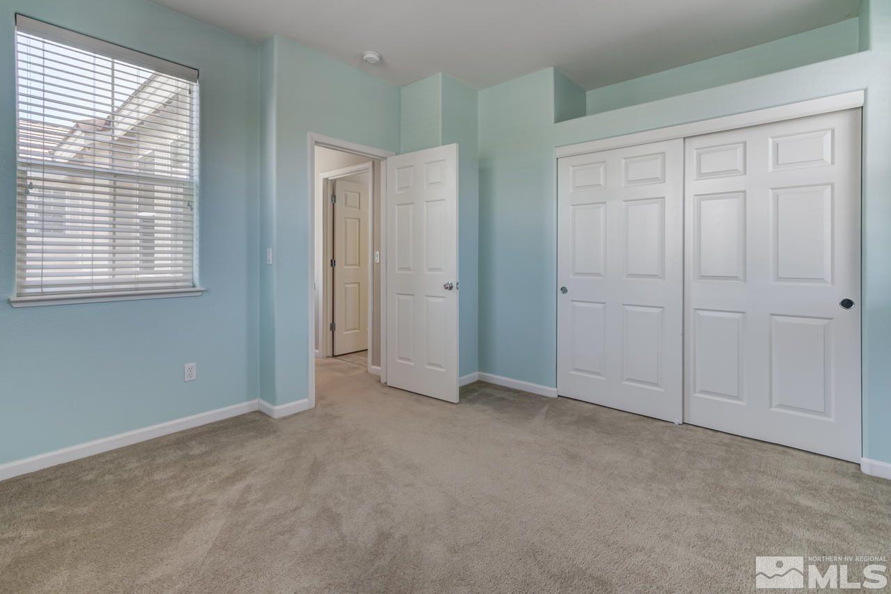 9070 Jack Hammer Drive Reno, NV 89521 - Photo 34 of 40 an empty room with windows