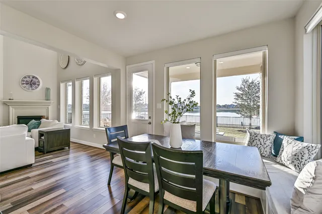 a room with a white bed and white walls