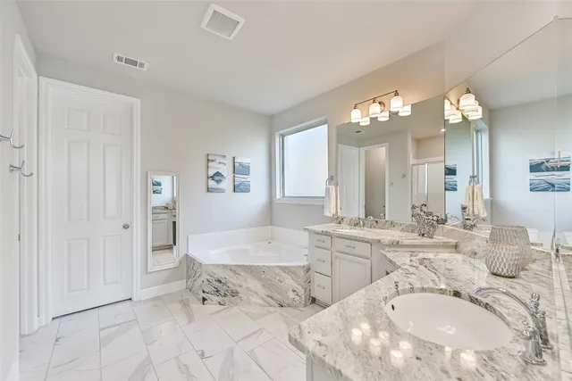 a bathroom with a shower curtain and toilet