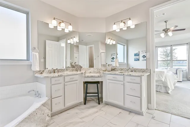 a view of swimming pool with a lounge chair