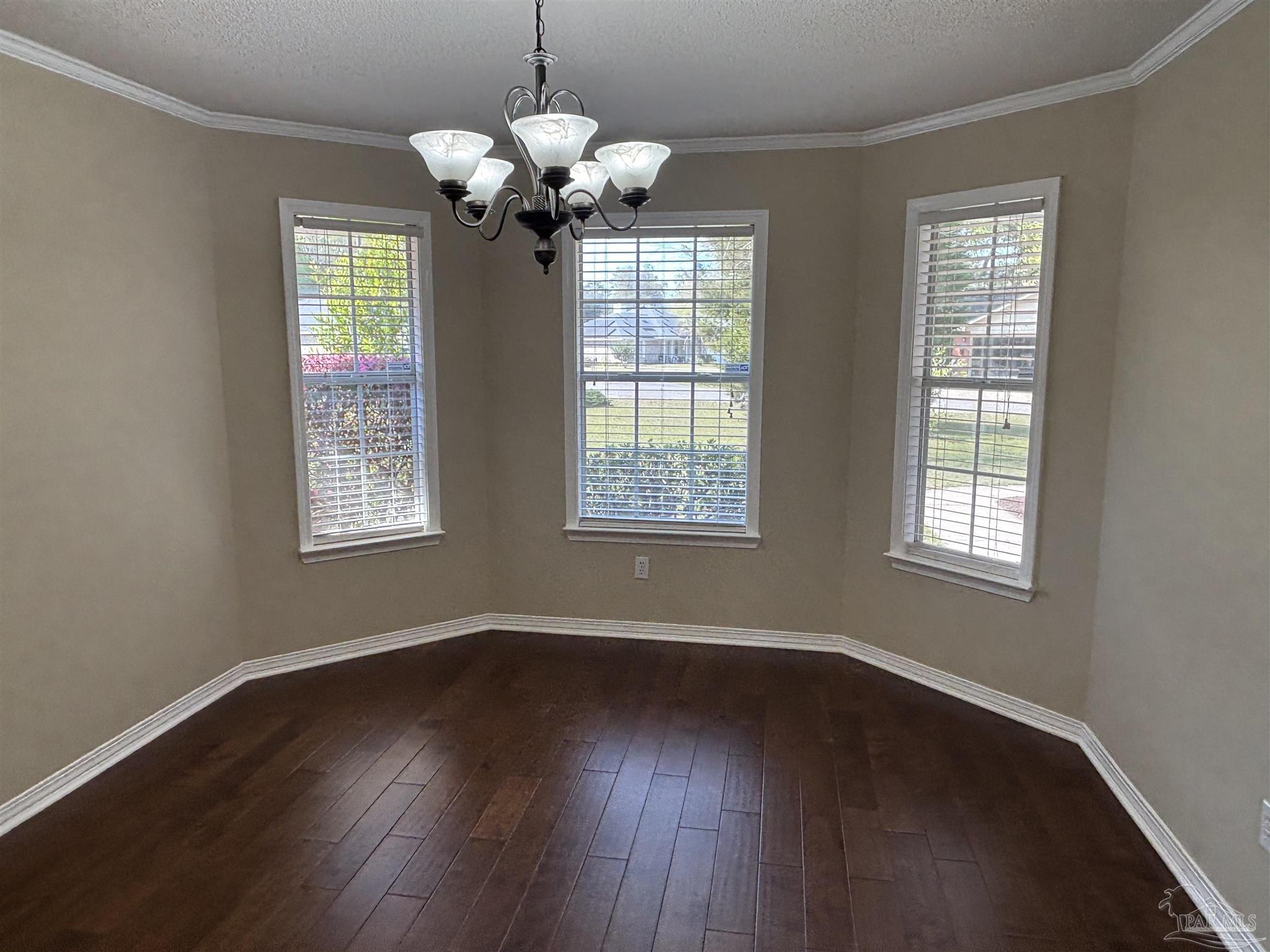 5309 Gillette Way Milton, FL 32570 - Photo 13 of 51 a view of a room with wooden floors