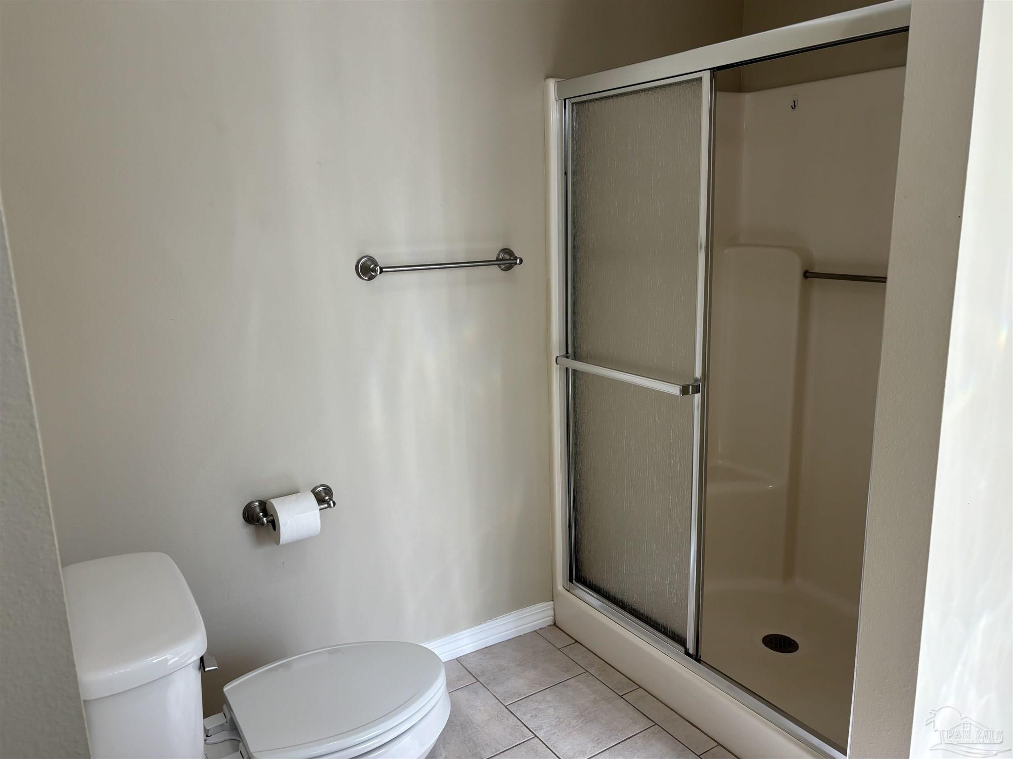 5309 Gillette Way Milton, FL 32570 - Photo 19 of 51 a bathroom with a toilet and a shower
