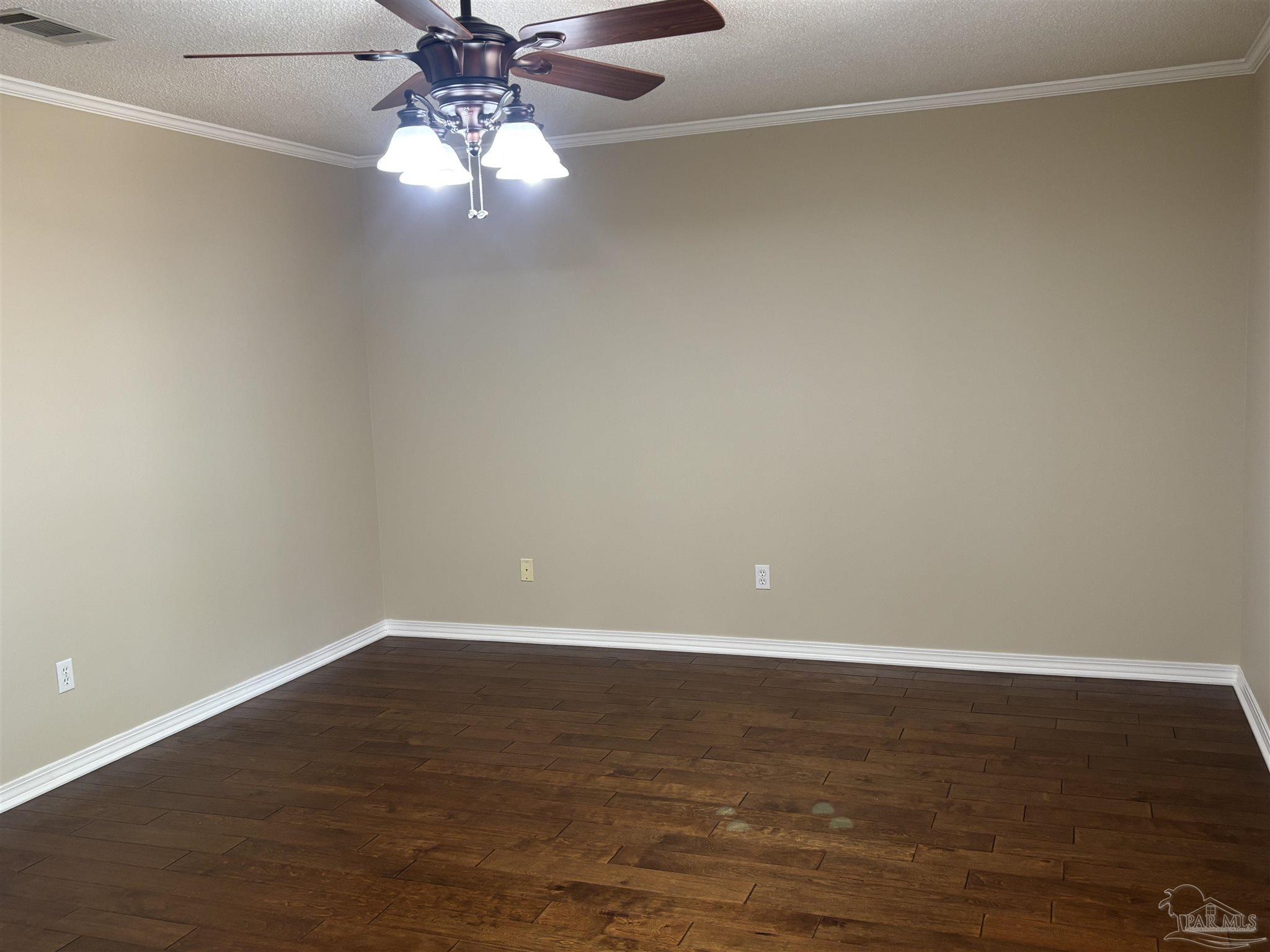 5309 Gillette Way Milton, FL 32570 - Photo 22 of 51 a view of an empty room with wooden floor