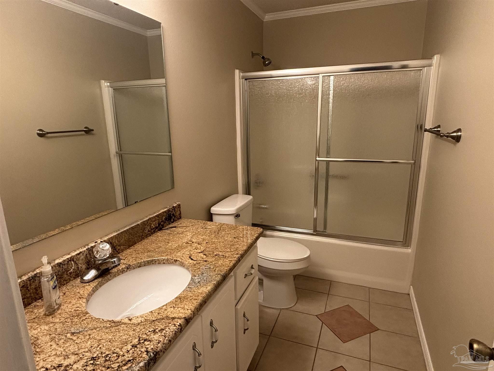 5309 Gillette Way Milton, FL 32570 - Photo 25 of 51 a bathroom with a granite countertop sink toilet and a mirror