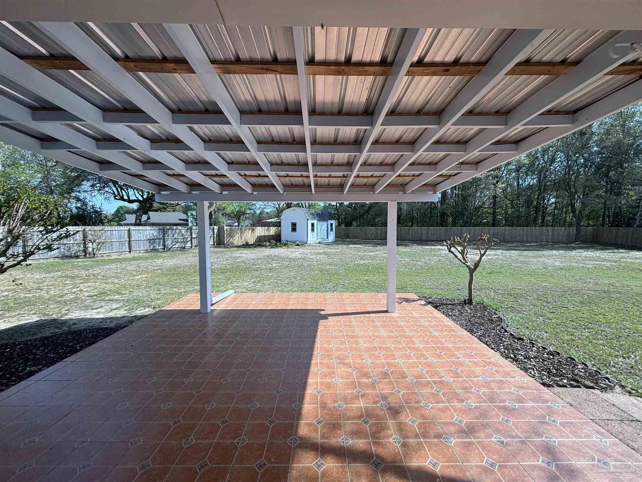 5309 Gillette Way Milton, FL 32570 - Photo 29 of 51 a view of a backyard with wooden floor