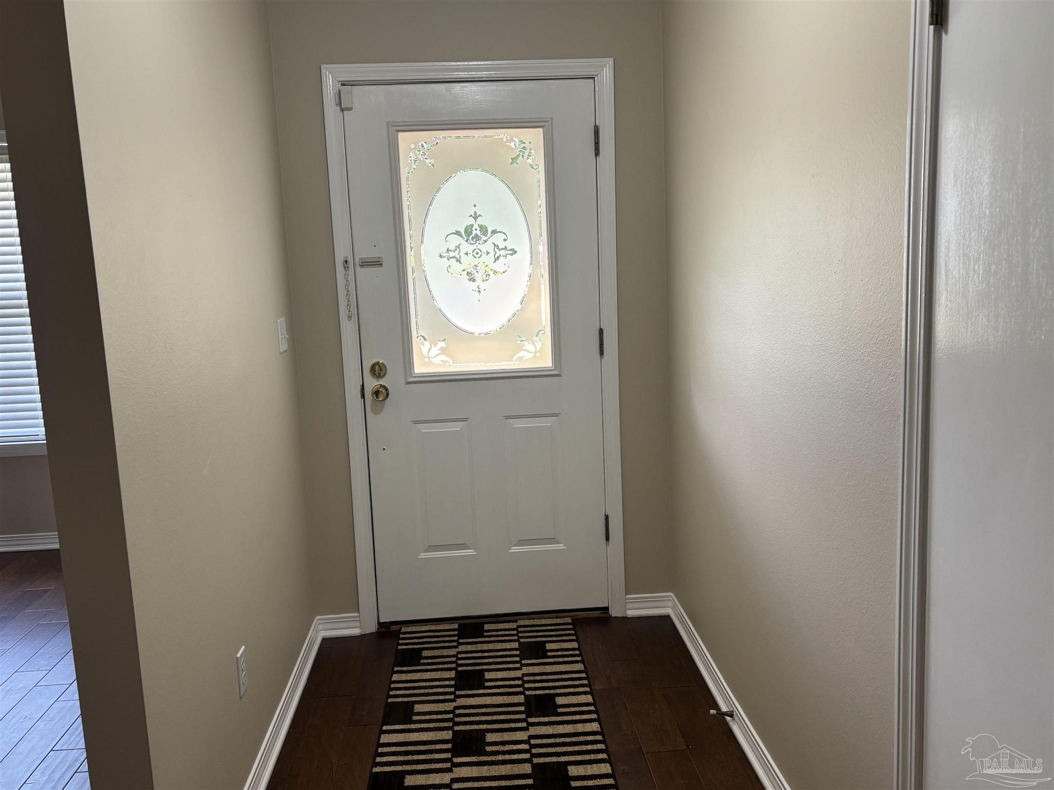 5309 Gillette Way Milton, FL 32570 - Photo 34 of 51 a room with window and wooden floor