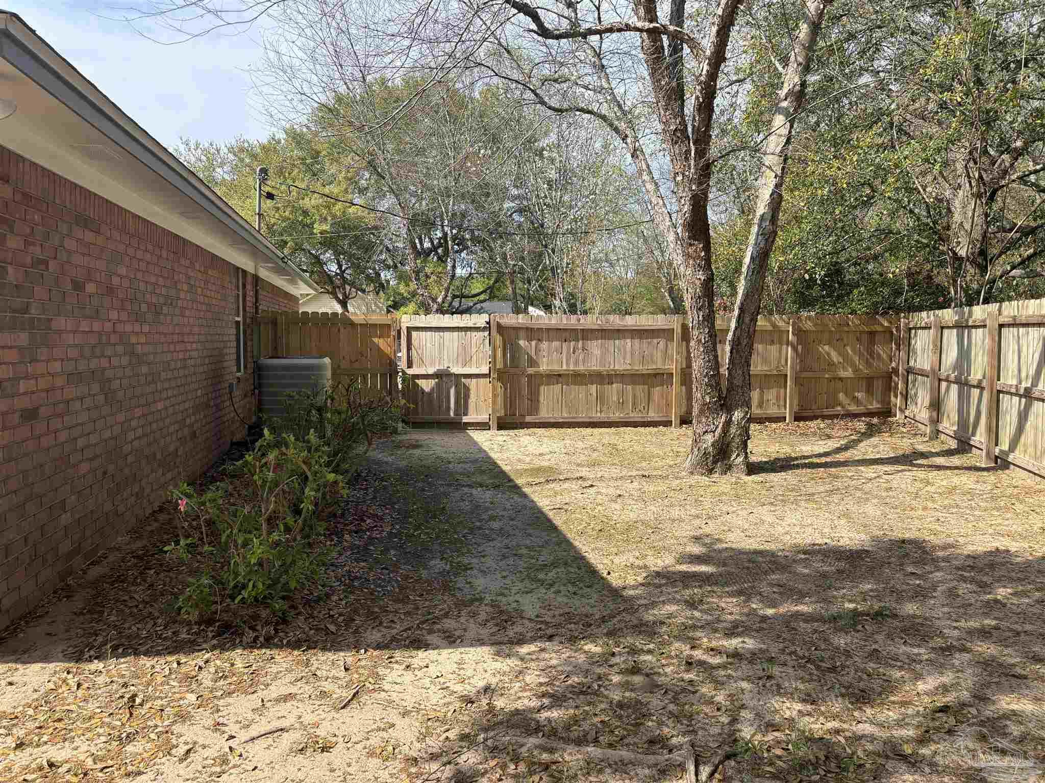 5309 Gillette Way Milton, FL 32570 - Photo 47 of 51 a view of a yard with snow on the road