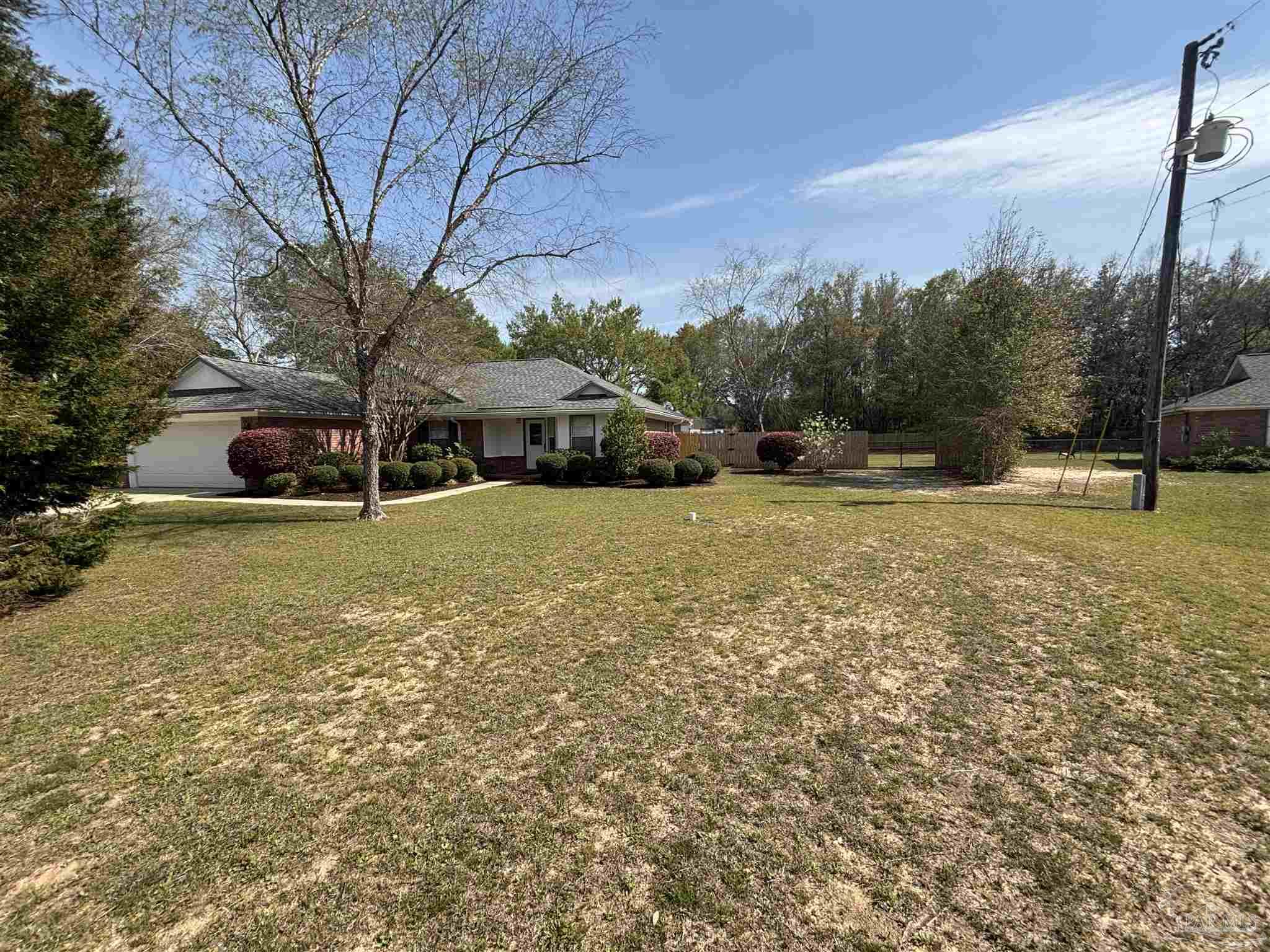 5309 Gillette Way Milton, FL 32570 - Photo 48 of 51 a view of a house with a yard
