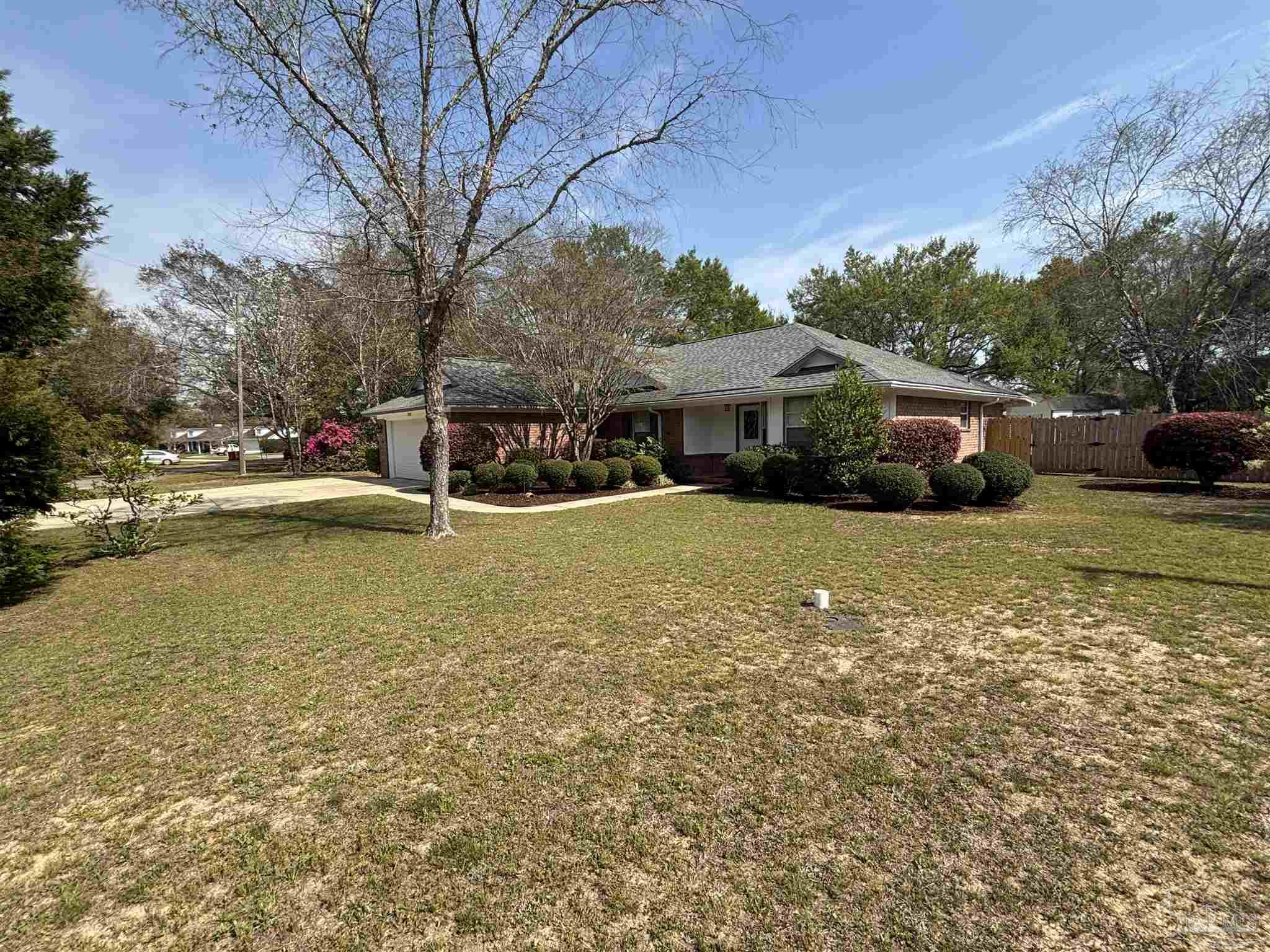 5309 Gillette Way Milton, FL 32570 - Photo 49 of 51 a view of a house with swimming pool and sitting area