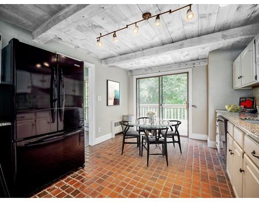 93 Edmands Road Framingham, MA 01701 - Photo 4 of 25 a dining room with furniture and a floor to ceiling window