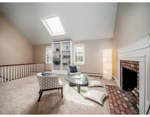 93 Edmands Road Framingham, MA 01701 - Photo 6 of 25 a living room with furniture and a fireplace