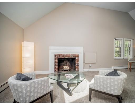 93 Edmands Road Framingham, MA 01701 - Photo 8 of 25 a living room with furniture and a fireplace