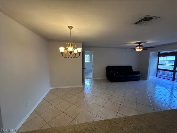 a view of an empty room with window