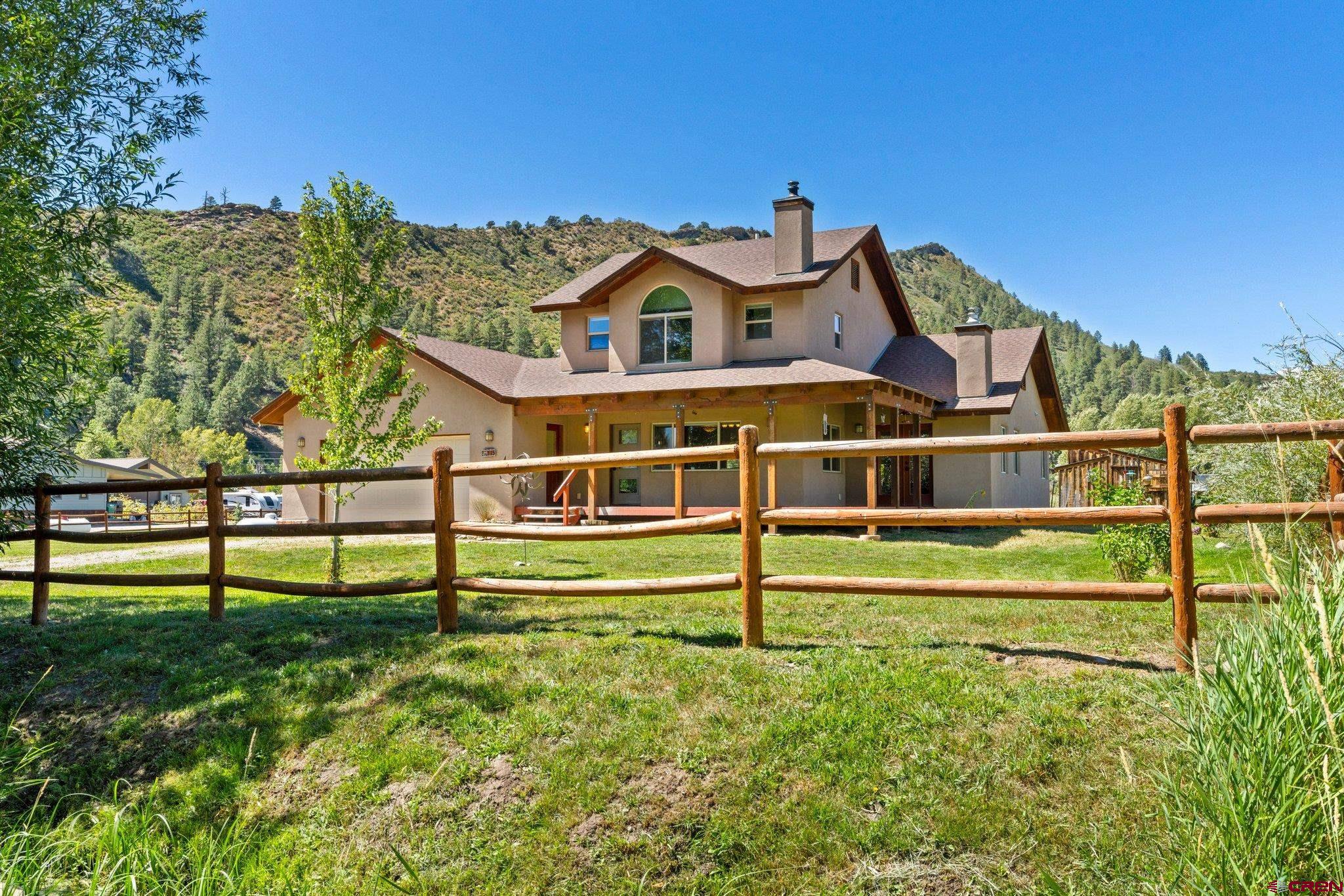 115 Pine River Ranch Circle Bayfield, CO 81122 - Photo 23 of 30 a view of a houses with a big yard