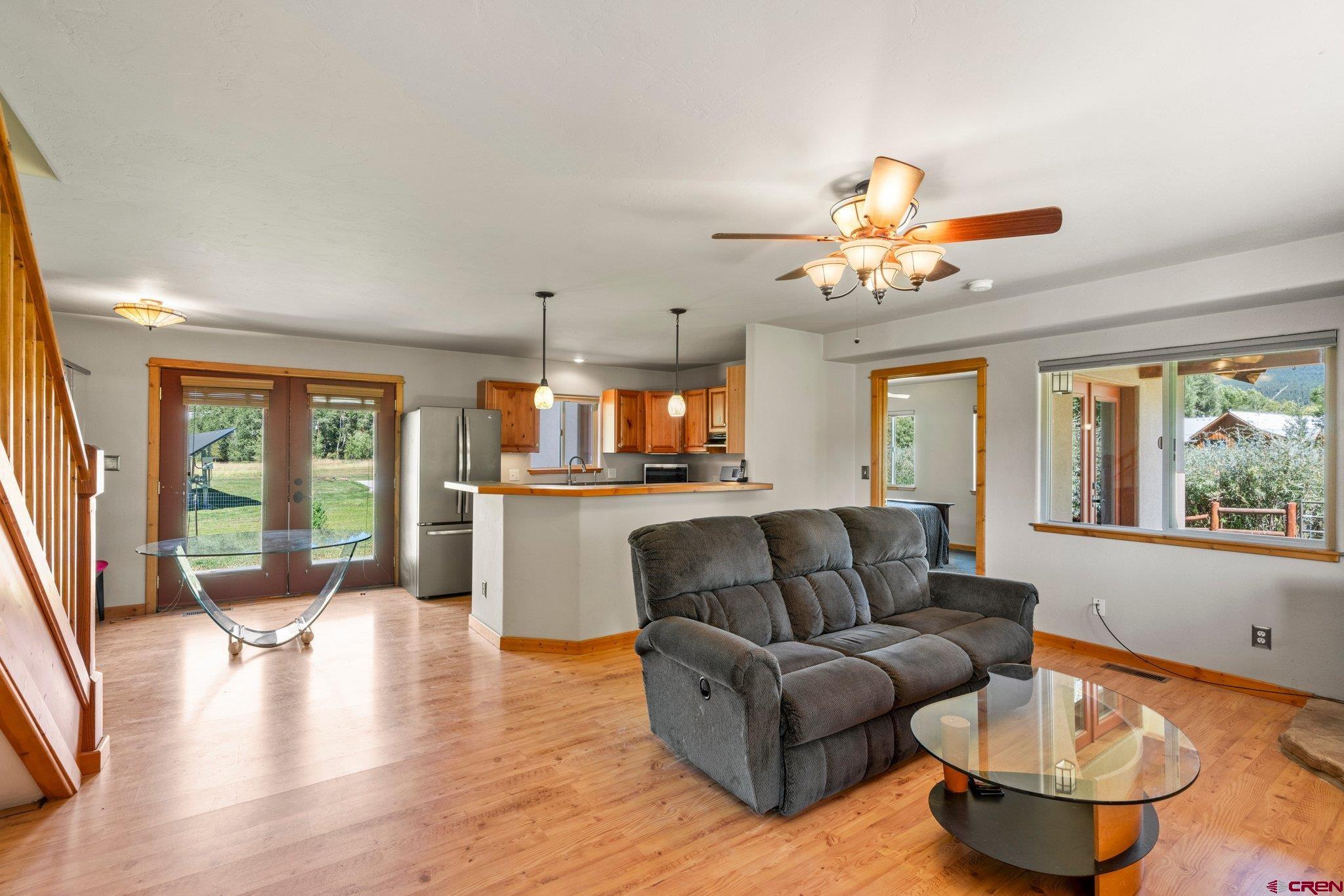 115 Pine River Ranch Circle Bayfield, CO 81122 - Photo 4 of 30 a living room with furniture and a large window