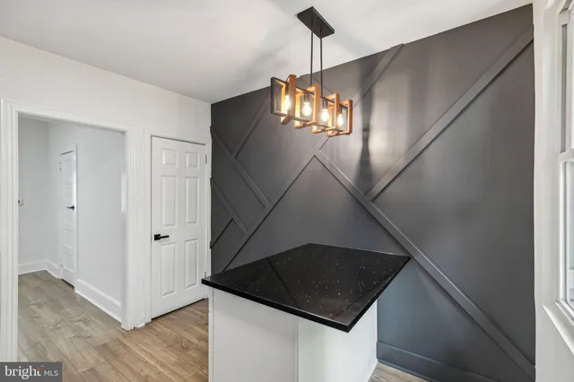 a view of a hallway view with staircase