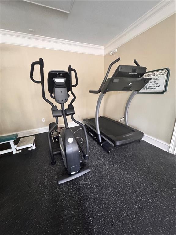 225 Bentley Place Tucker, GA 30084 - Photo 17 of 18 a room with gym equipment