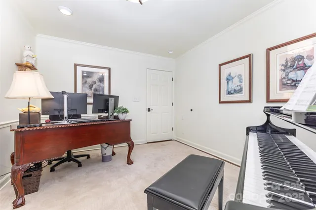 a workspace with furniture and window