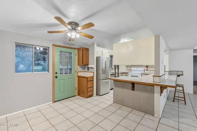 a view of outdoor space with deck and tree