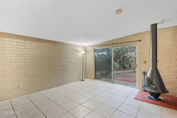 a view of balcony with furniture