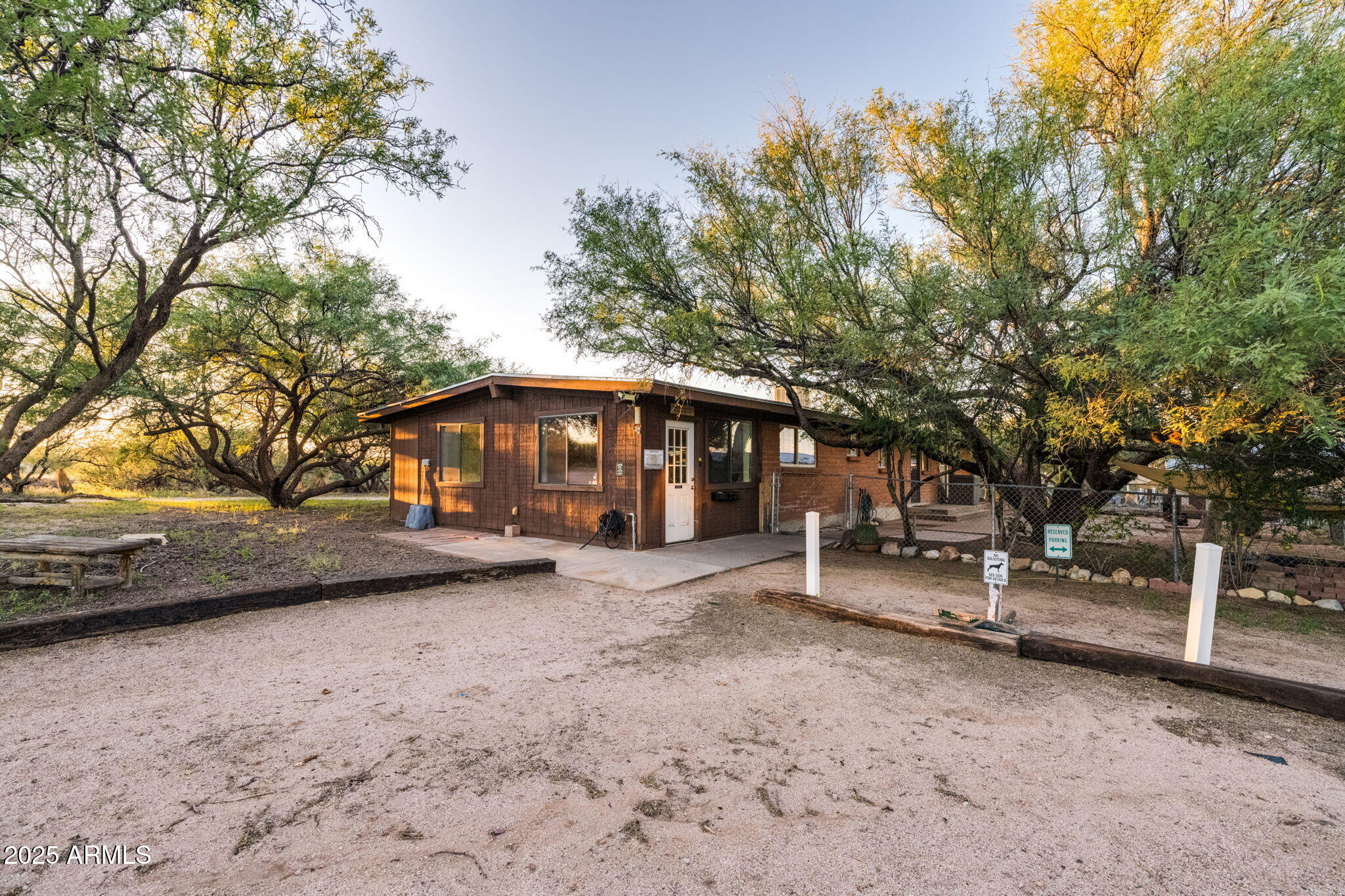 3036 West Williams Road Benson, AZ 85602 - Photo 27 of 50 a view of a house with a yard and tree s