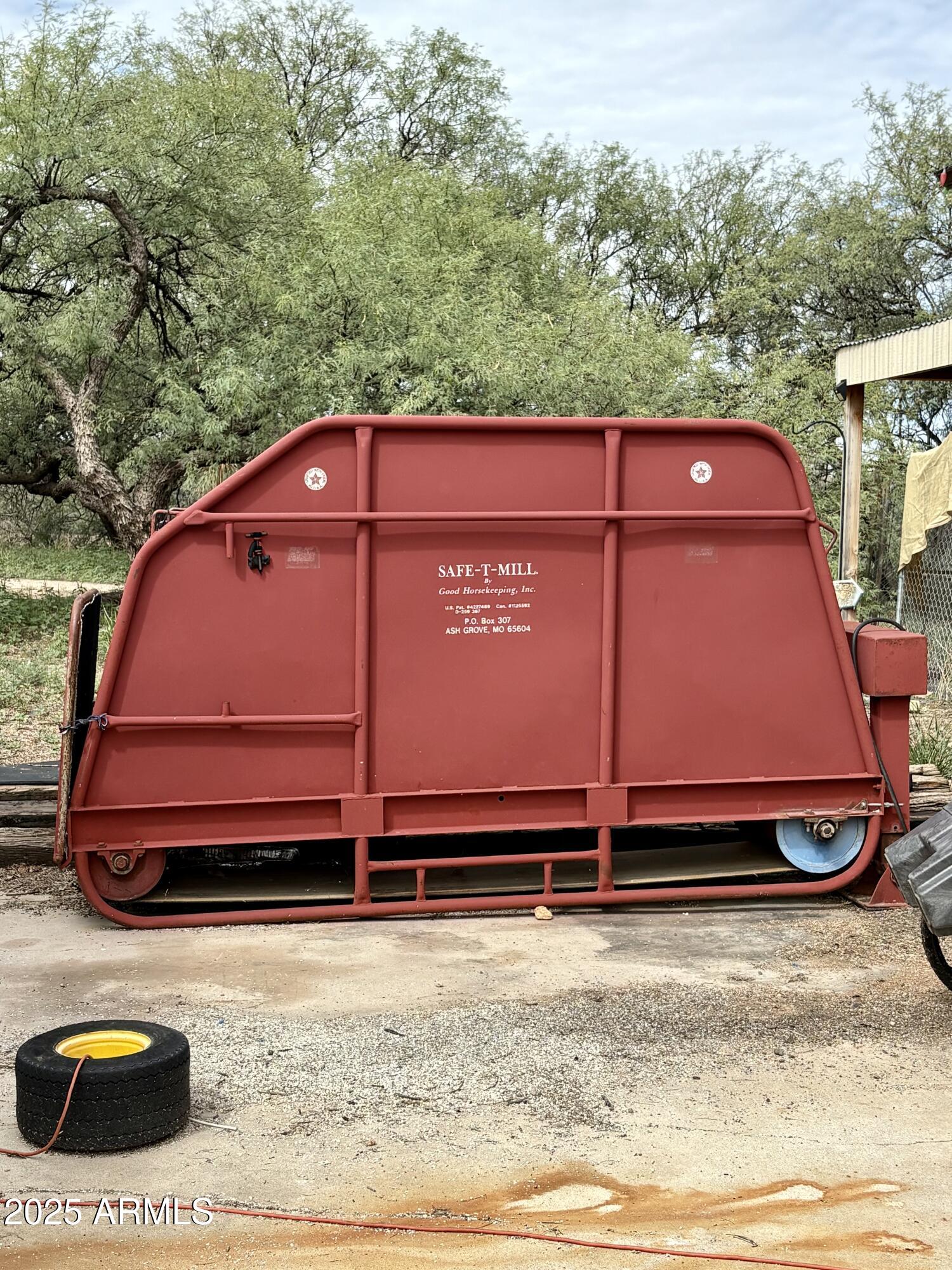 3036 West Williams Road Benson, AZ 85602 - Photo 31 of 50 a backyard of a house with barbeque oven