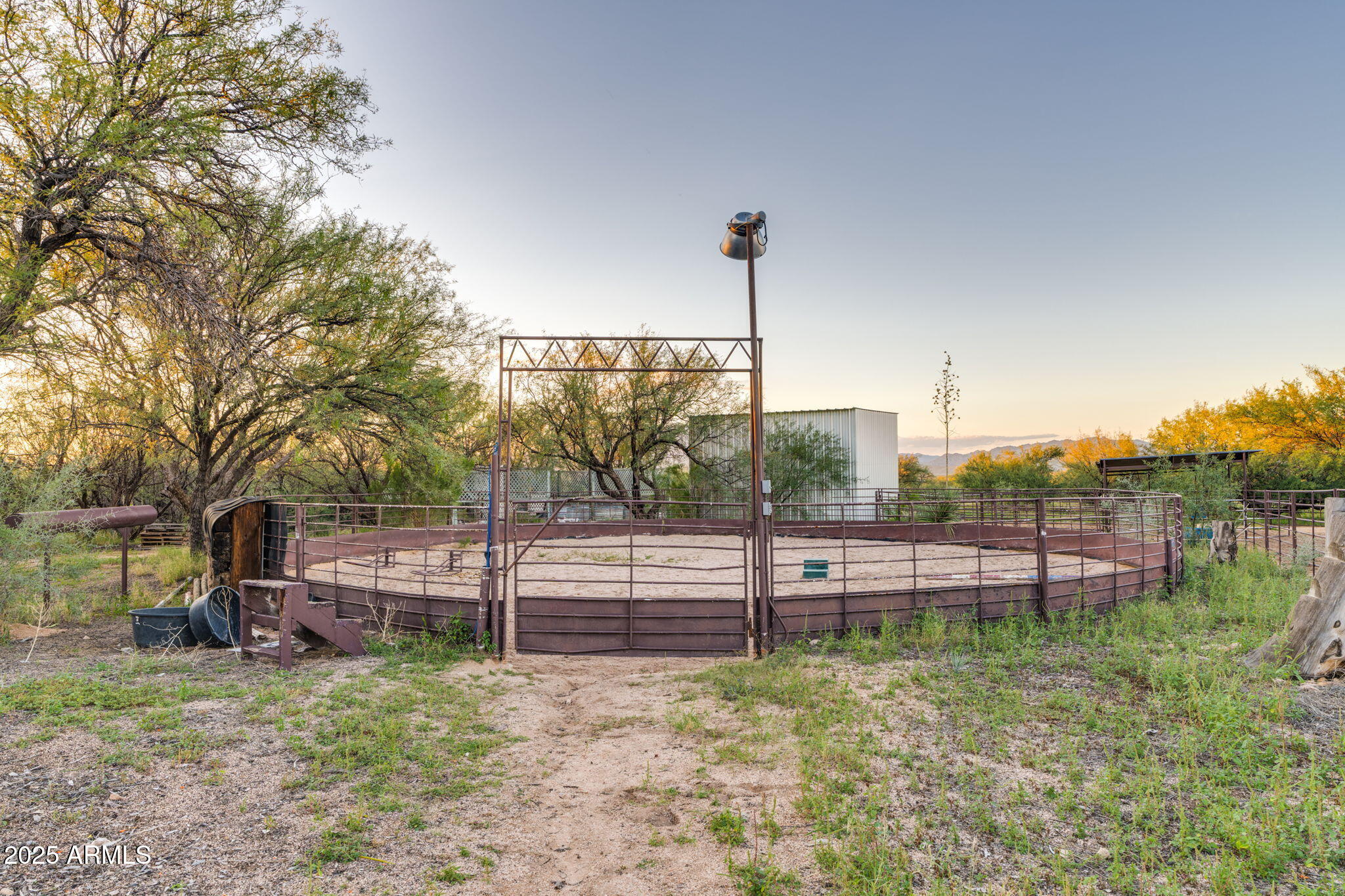 3036 West Williams Road Benson, AZ 85602 - Photo 36 of 50 a view of outdoor space with fenced yard and outdoor seating