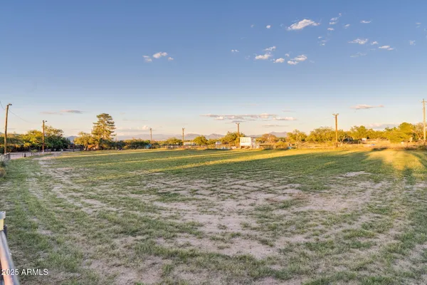 a kitchen with a cabinets and chandelier