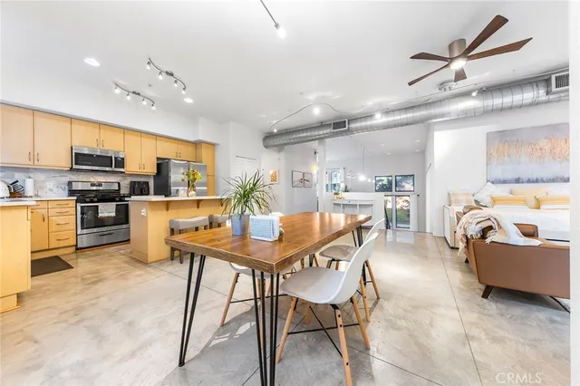 a kitchen with a sink cabinets and window