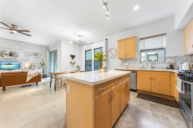 a view of a storage & utility room with a washer dryer