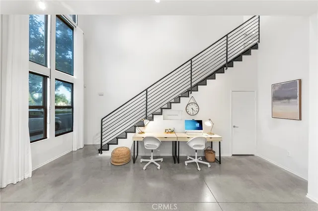 a room with table and chairs