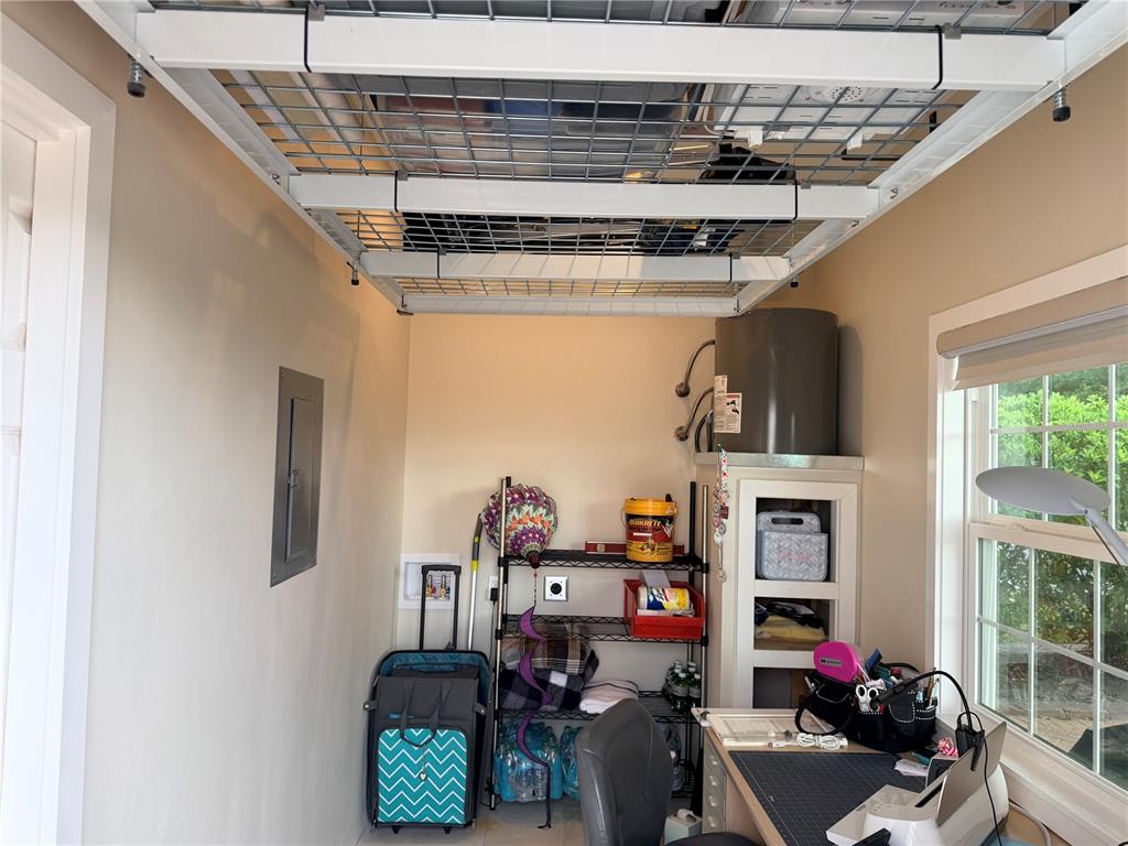 9465 Southeast 47th Way Webster, FL 33597 - Photo 18 of 32 a view of storage and utility room