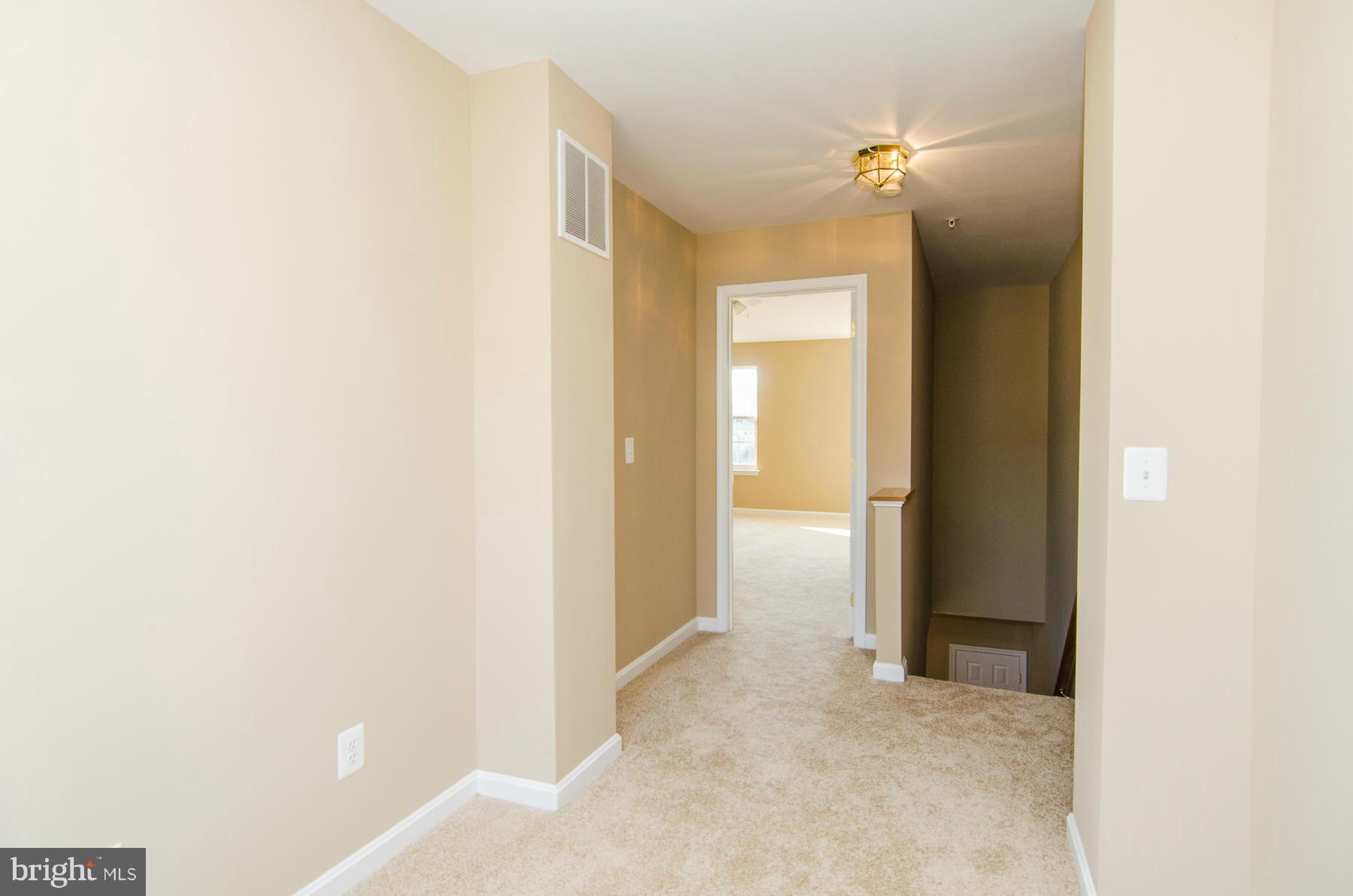 4034 Cutty Sark Road Baltimore, MD 21220 - Photo 11 of 30 a view of a room that has a large window