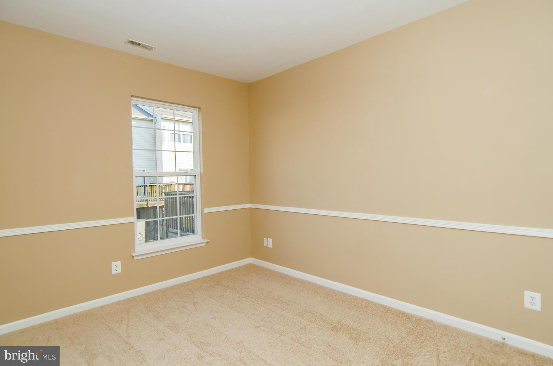 4034 Cutty Sark Road Baltimore, MD 21220 - Photo 16 of 30 a view of an empty room with a window