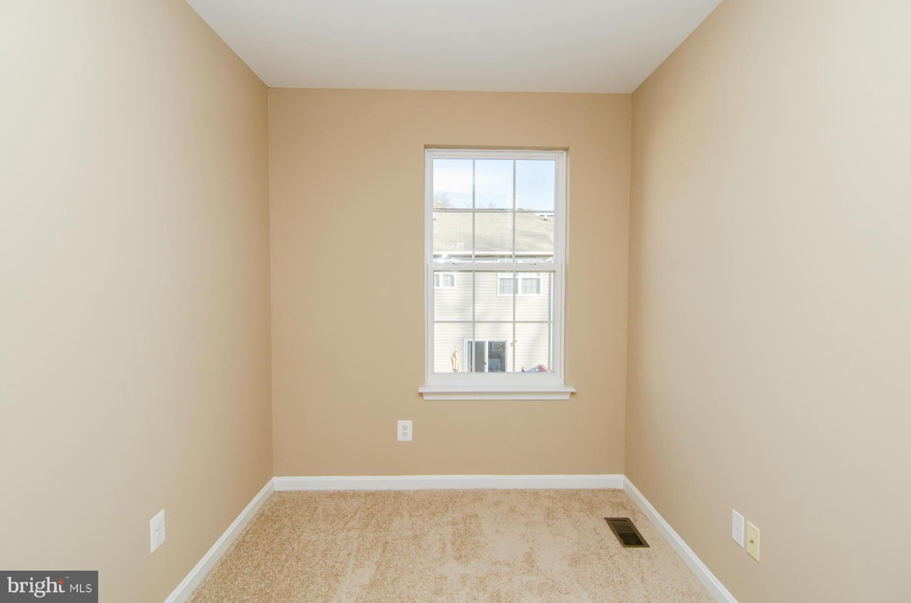 4034 Cutty Sark Road Baltimore, MD 21220 - Photo 26 of 30 an empty room with a window