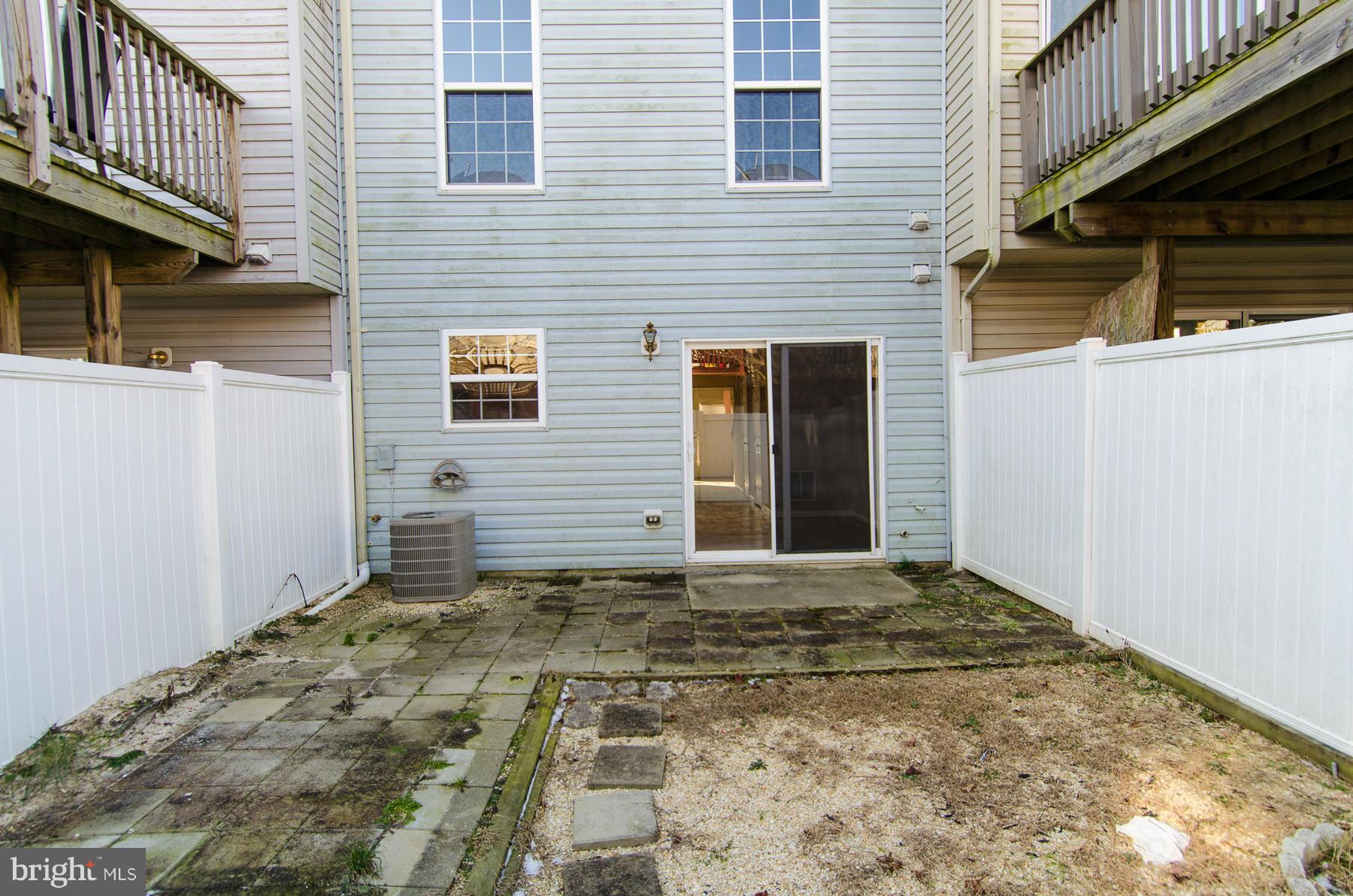 4034 Cutty Sark Road Baltimore, MD 21220 - Photo 28 of 30 a view of a backyard of a house