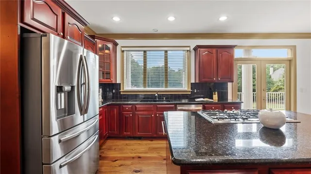 a bed room with a bed and a window