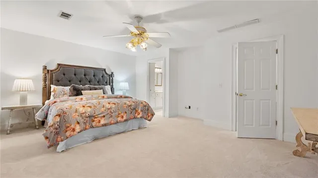 a view of swimming pool with outdoor seating and lake view