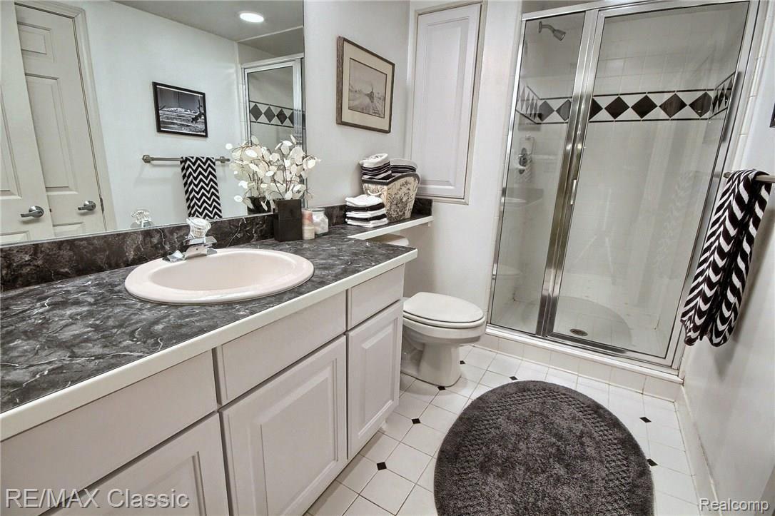 35610 Tall Pine Road Farmington, MI 48335 - Photo 27 of 32 Ceramic Bathroom in Finished Basement