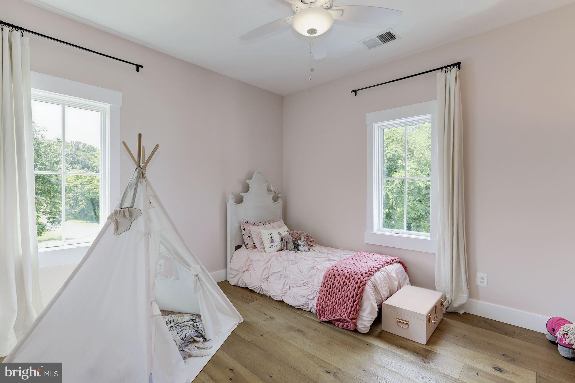 254 Friendship Road Tracys Landing, MD 20779 - Photo 17 of 21 a bed room with a bed and a window