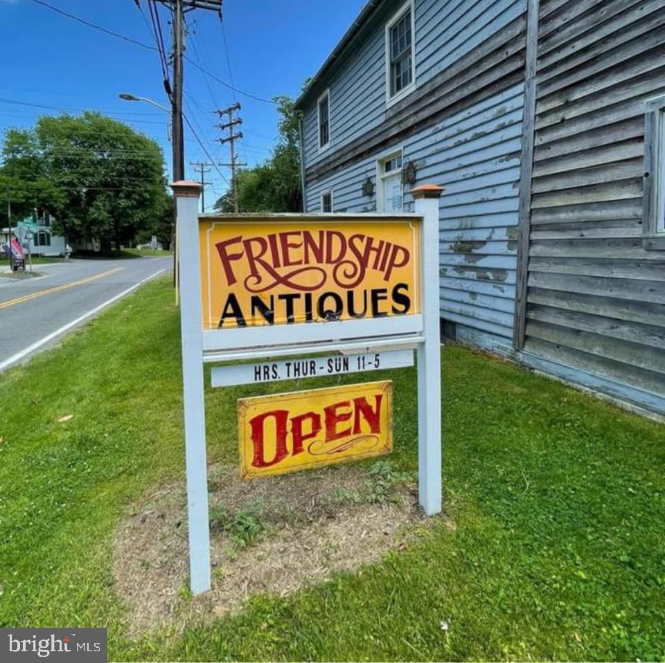 254 Friendship Road Tracys Landing, MD 20779 - Photo 21 of 21 a sign on the side of a building