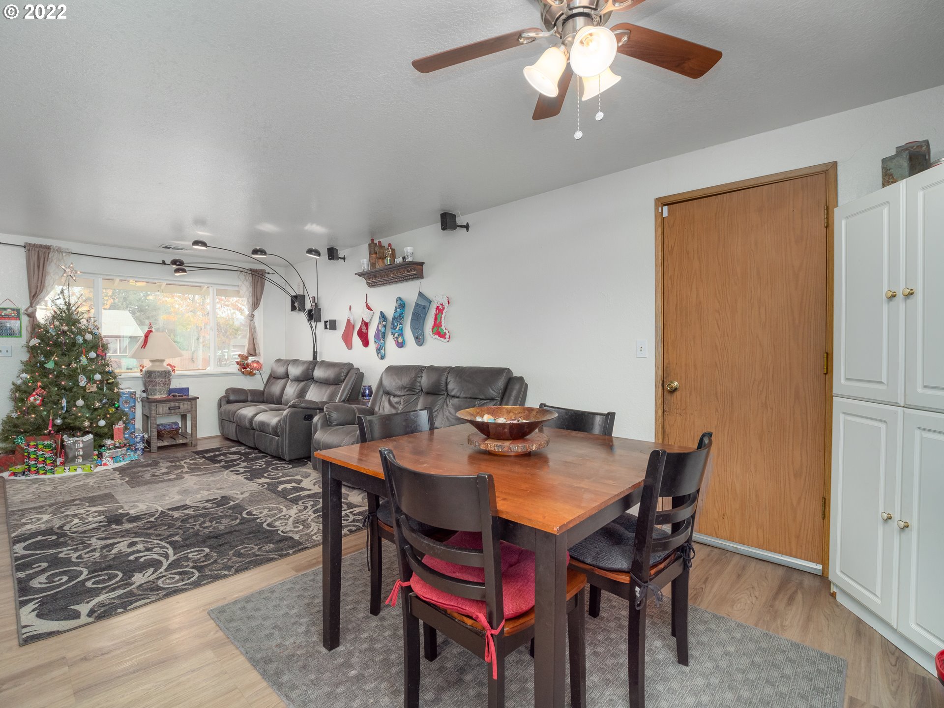 206 Columbia Loop Road Roseburg, OR 97471 - Photo 4 of 24 a view of a dining room with furniture and a chandelier